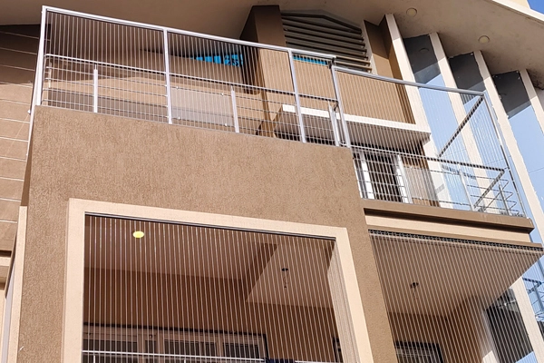 Invisible grill installation in Gurugram balcony - AS Enterprises
